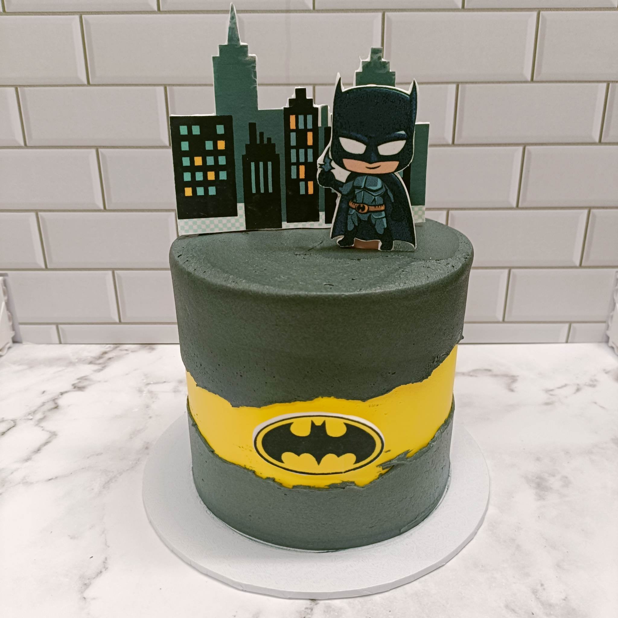 The Royal Bakery - A Batman cake for Justin who celebrated his 13th  birthday this week. He wanted a 'grown up' Batman topper, and we decided on  this one, which is a